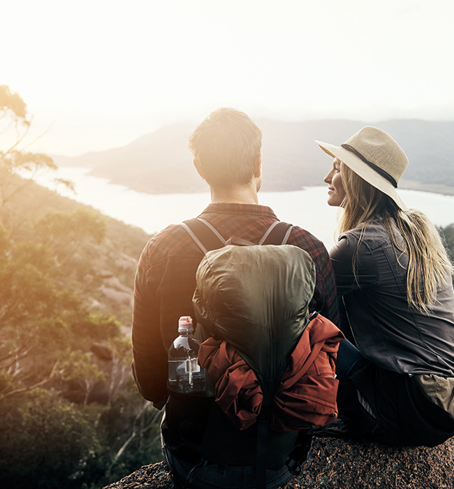 man and woman hiking