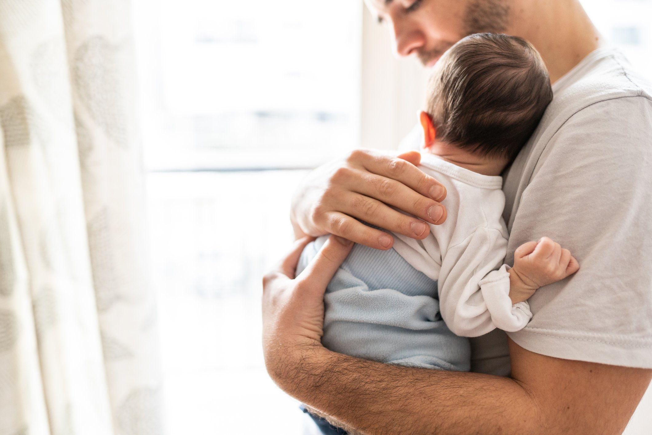Father holding baby